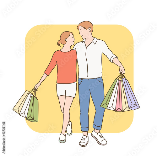A couple is walking down the street with shopping bags in their hands. hand drawn style vector design illustrations. 