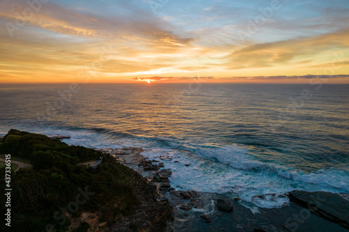 Aerial Sunrise Seascape at Rocky Inlet with colourful high cloud