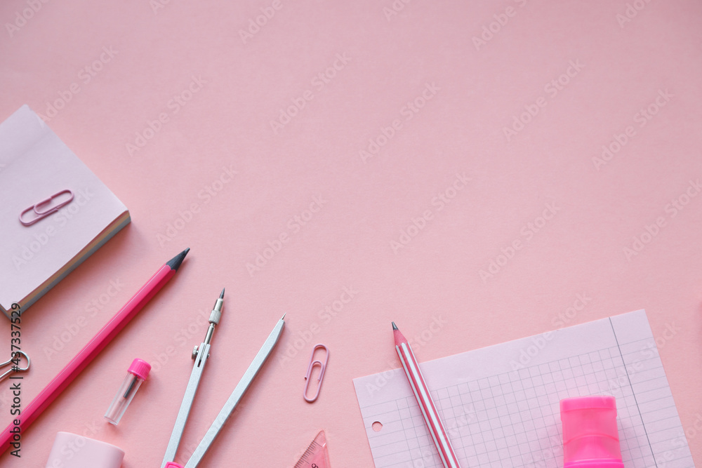 Stationary concept, Flat Lay top view Photo of school supplies scissors, pencils, paper clips,calculator,sticky note,stapler and notepad in pastel tone on pink background with copy space, flat lay. Stationary concept, Flat Lay top view Photo of school supplies scissors, pencils, paper clips,calculator,sticky note,stapler and notepad in pastel tone on pink background with copy space, flat lay.