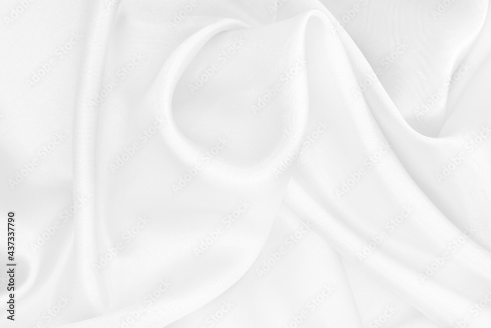 White fabric texture background, detail of silk or linen pattern. White fabric texture background, detail of silk or linen pattern.