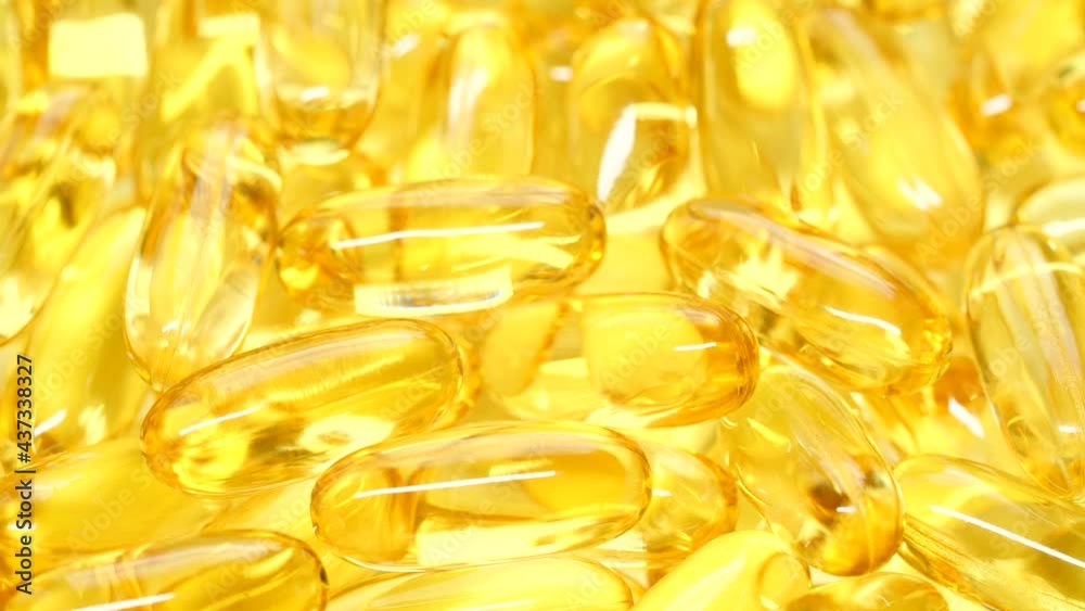 4K closeup Omega 3 fish oil pills background, vitamin E natural capsules texture 4K closeup Omega 3 fish oil pills background, vitamin E natural capsules texture