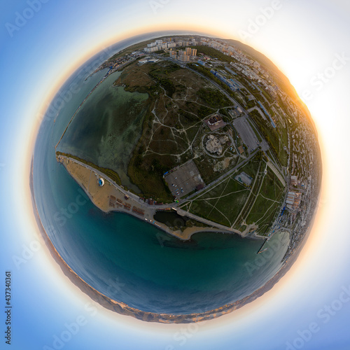 Novorossiysk, Russia. The central part of the city. Sudzhukskaya Spit. Sunset. 360 degree aerial panoramic asteroid photo