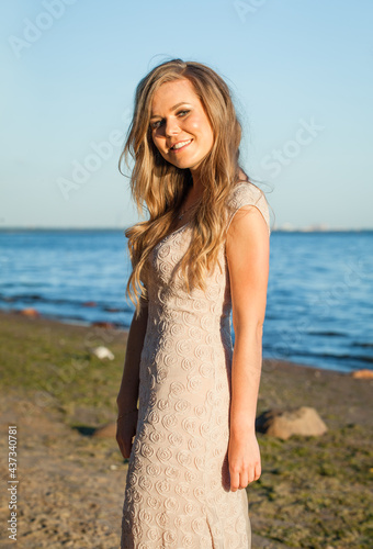 Pretty smiling woman outdoor portrait © millaf
