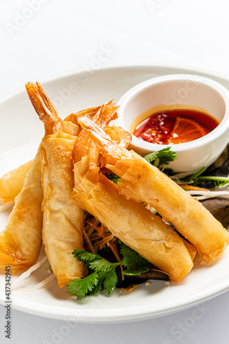 spring rolls with sauce and salad photo