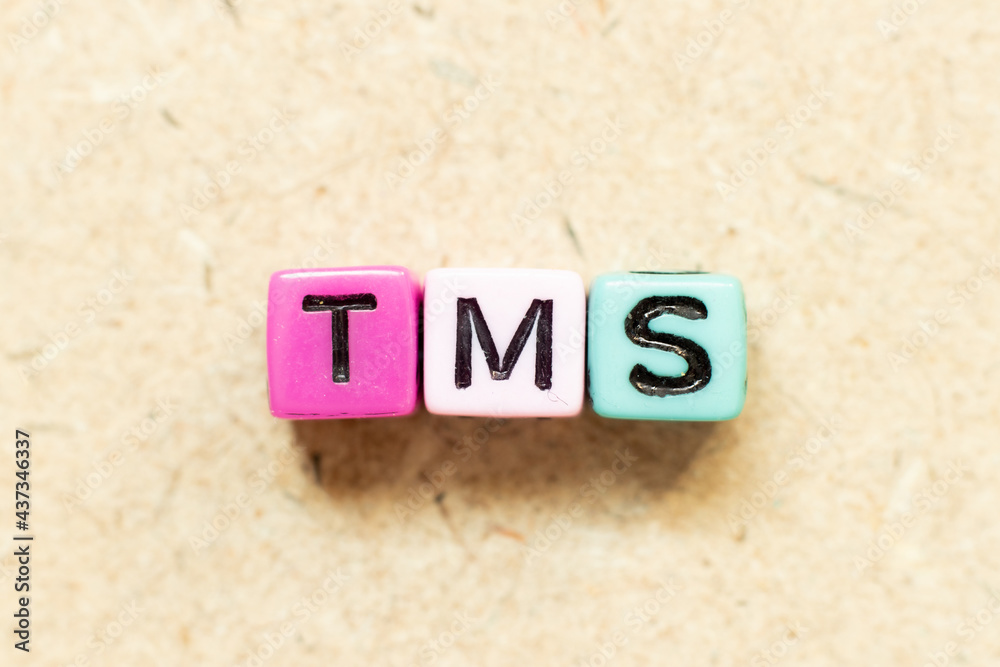 Color alphabet letter block in word TMS (Abbreviation of Transportation  management system or Transcranial magnetic stimulation) on wood background  Stock Photo | Adobe Stock