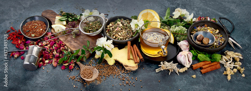 Various kinds of herbal tea on dark background. Natural herbs medicine. © bit24