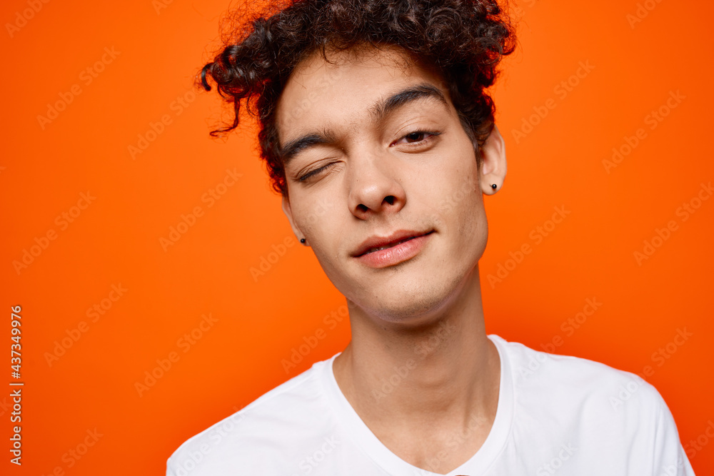 guy with curly hair in a white t-shirt emotion grimace guy with curly hair in a white t-shirt emotion grimace