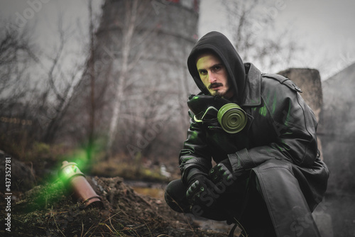 Post apocalypse soldier with an artefact container concept. photo