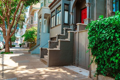 Facades of townhouses with famous Victorian architecture  streets in San Francisco