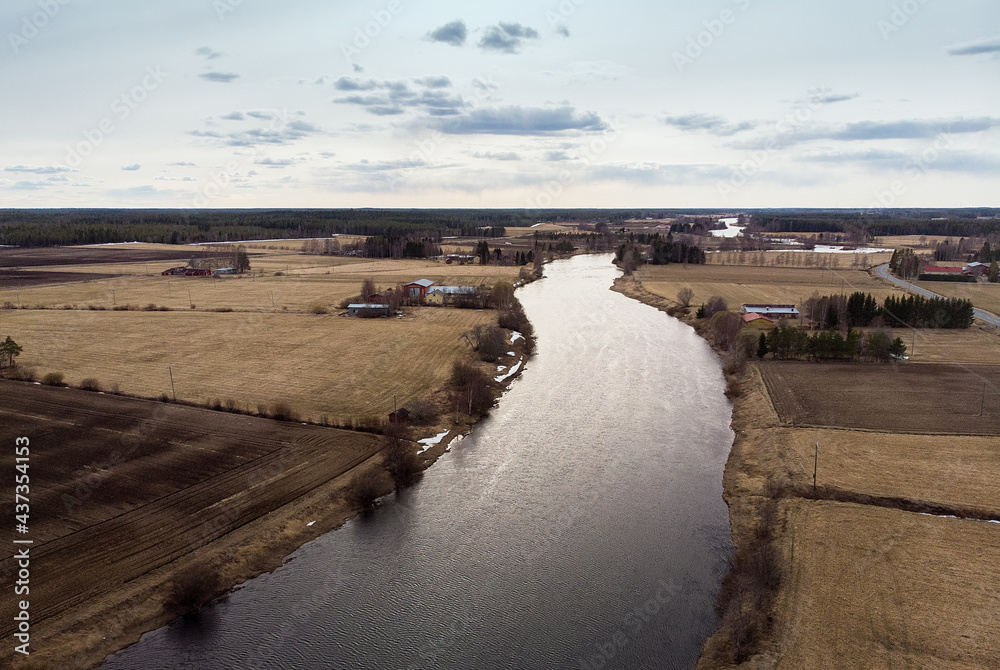 Fototapeta premium River Runs Through The Fields