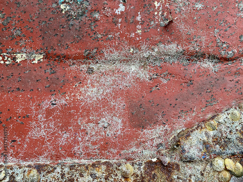 Rusty metal surface of red color