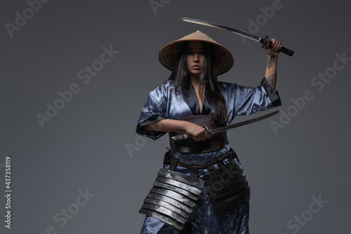 Eastern woman samurai with kasa and katanas