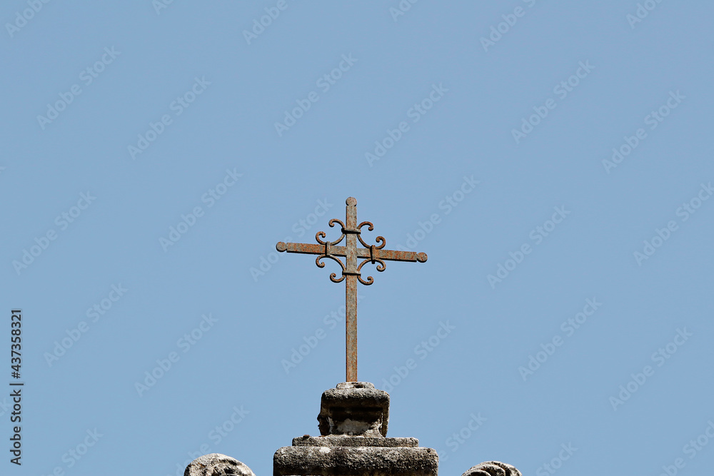 Catholic Cross on the top of a Catholic Church on Sky Background Catholic Cross on the top of a Catholic Church on Sky Background
