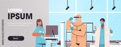 mix race scientists developing vaccine to fight against coronavirus researchers team working in medical lab