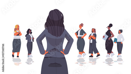 female leader standing in front of mix race businesspeople women's team leadership business competition