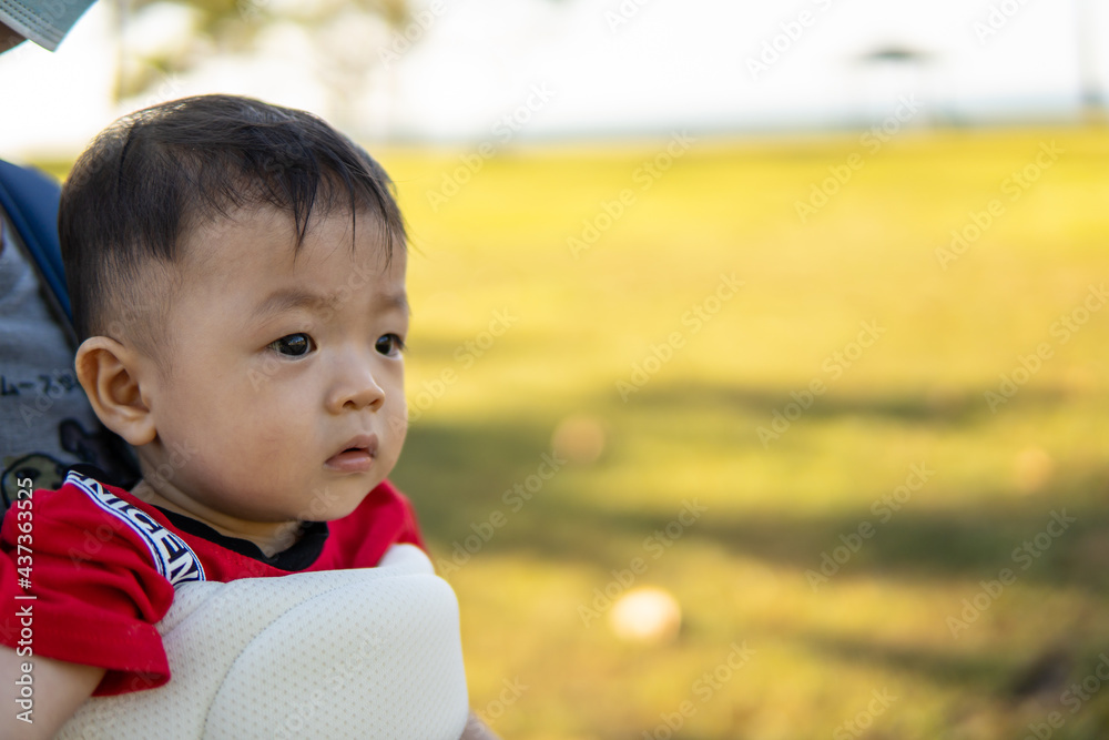 Happy Mother carry Baby at outdoors during short term holiday Happy Mother carry Baby at outdoors during short term holiday