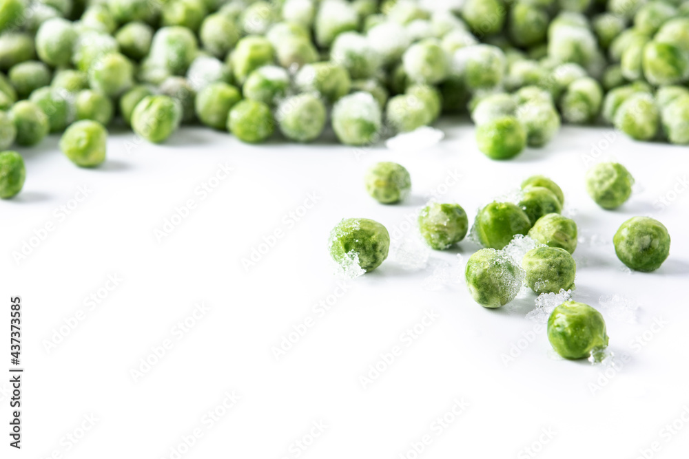 Frozen green peas isolated on white background. Copy space Frozen green peas isolated on white background. Copy space