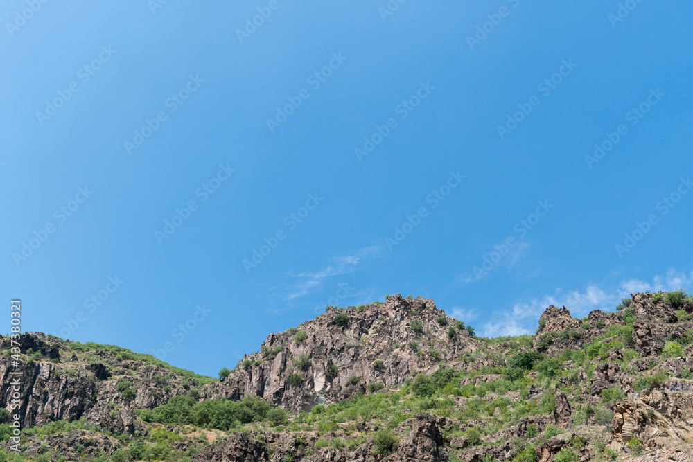 Cliffs on blue sky background