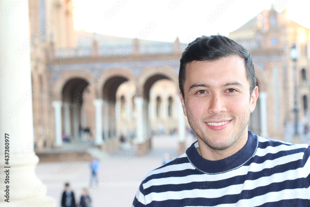Cute young guy with a nautical style striped sweater Cute young guy with a nautical style striped sweater