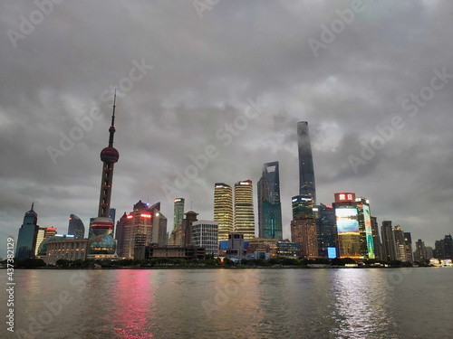 Skyline view in the evening. Shanghai Tower, Jin Mao Tower, Oriental Pearl Tower and Shanghai World Financial Center. Modern skyscrapers in Pudong district. China. Asia photo