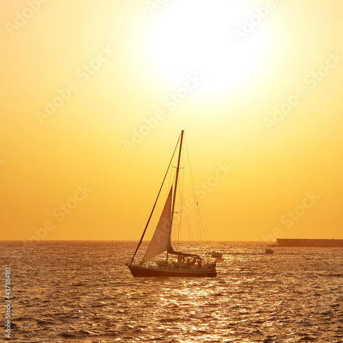 Sail boat against sea sunset © Pavlo Vakhrushev