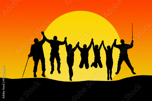 Silhouette of jumping friends in sunset against big yellow sun