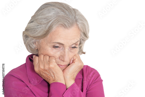 Sad senior woman isolated on white background