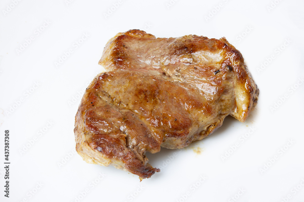 Piece of fried meat on a white background