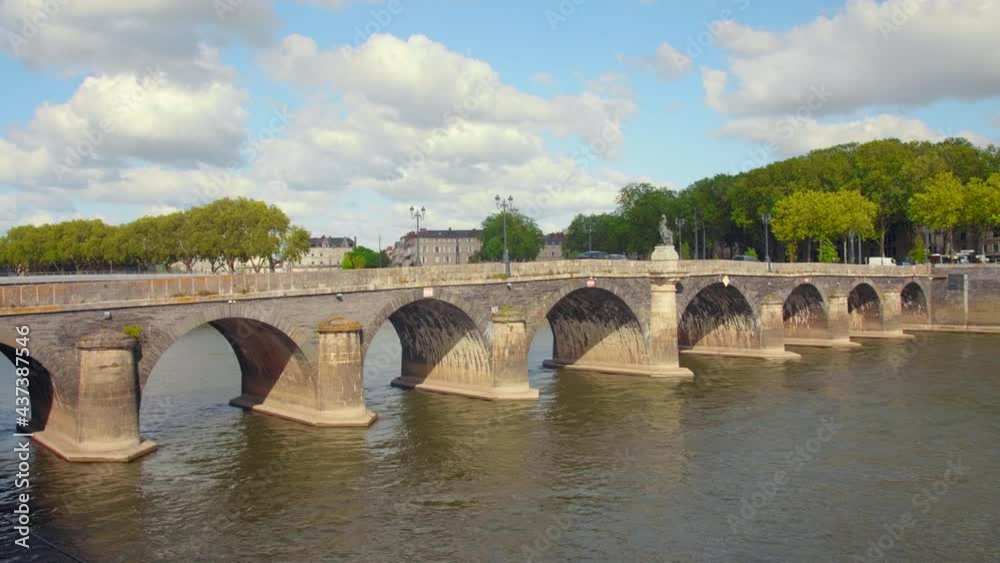 Angers, Maine-et-Loire, France. The Verdun Bridge (pont de Verdun) is a bridge crossing the Maine River in the center of Angers that connects downtown to the La Doutre district. Angers, Maine-et-Loire, France. The Verdun Bridge (pont de Verdun) is a bridge crossing the Maine River in the center of Angers that connects downtown to the La Doutre district.