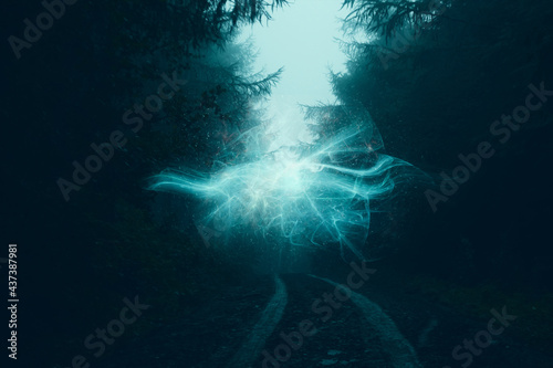 An atmospheric fantasy concept. Of a glowing alien portal in a spooky forest. On a foggy winters day