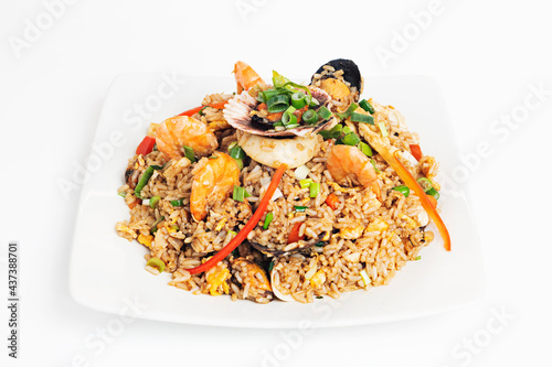 chaufa rice recipe with prawns, mussels, scallops, squid, vegetables, scrambled eggs photo