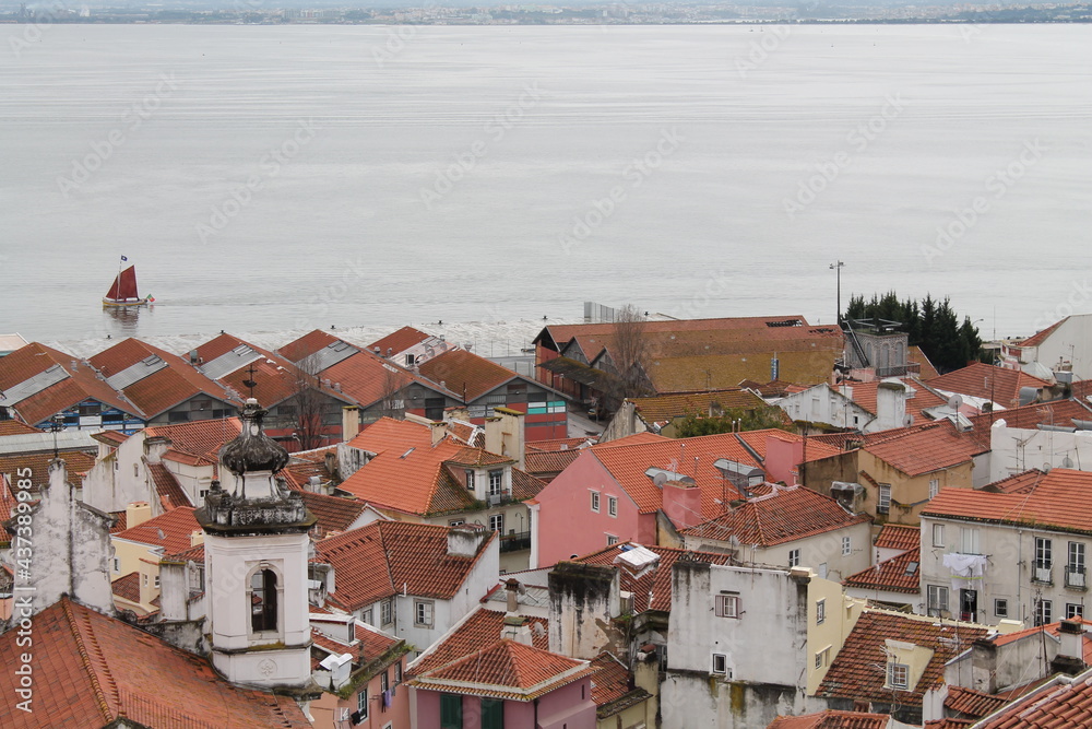 Portuguese landscape with houses and boat in the background Portuguese landscape with houses and boat in the background