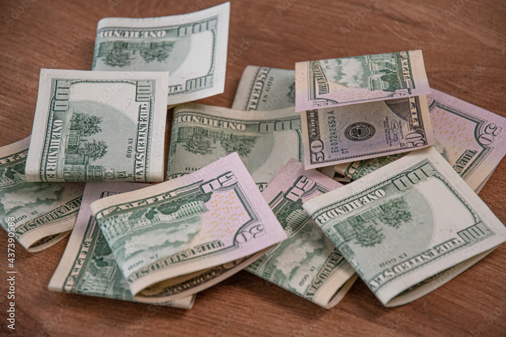 Closeup Of Fifty Dollar Bills On Wooden Table. Fifty Dollar Stock