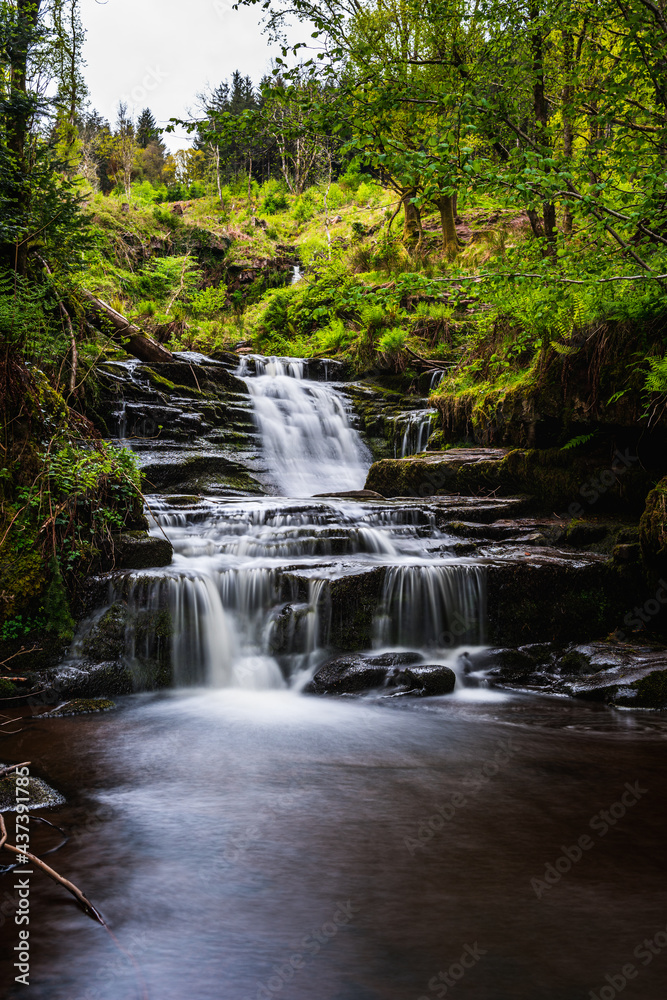 Little waterfall on the way to Blaen y Glyn Isaf Waterfall, Brecon Beacons, Wales, England Little waterfall on the way to Blaen y Glyn Isaf Waterfall, Brecon Beacons, Wales, England