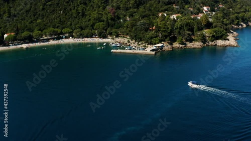 Moscenicka Draga Beach - Fishing Boat Returning At The Port Of Moscenicka Draga In Croatia. - aerial photo