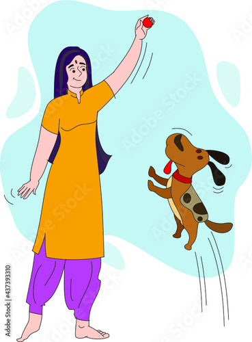 Happy Indian girl playing with the dog