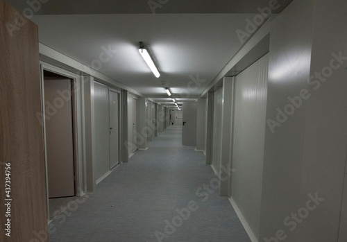 an aisle or hallway of a building photo