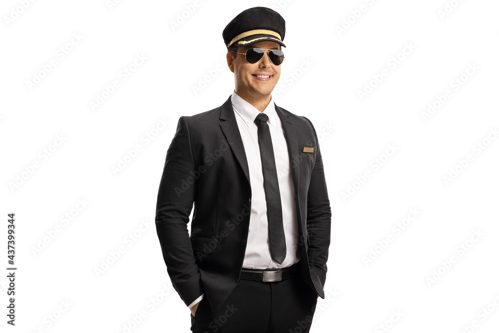Young professional driver in a uniform and sunglasses smiling at camera Young professional driver in a uniform and sunglasses smiling at camera