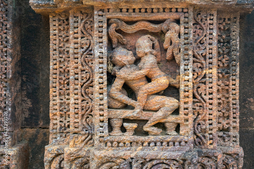 Close up of Kamasutra scenes on the wall of Konark sun temple, Odisha 