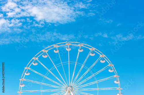 Ferris Wheel with Blue Sky and clouds