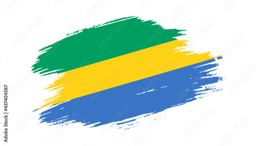 Obraz premium Patriotic of Gabon flag in brush stroke effect on white background