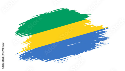 Patriotic of Gabon flag in brush stroke effect on white background