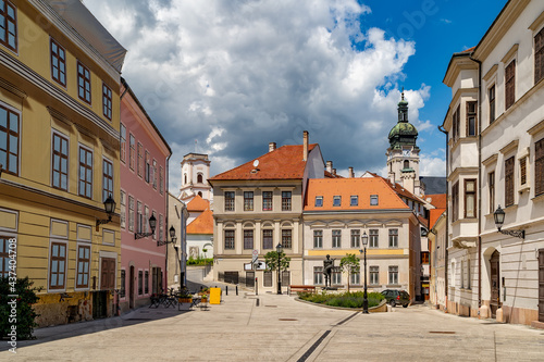 Cozy little baroque square in the center of Gyor, with the bronze sculpture of Nimrod, in the background the Cathedral tower and the Bishop-Lookout Tower 