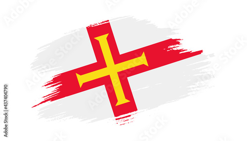 Patriotic of Guernsey flag in brush stroke effect on white background