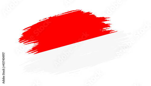 Patriotic of Indonesia flag in brush stroke effect on white background