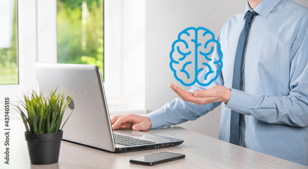 Businessman holding abstract brain and icon tools, device, customer network connection communication on virtual , innovative development future technology, science, innovation and business concept. Businessman holding abstract brain and icon tools, device, customer network connection communication on virtual , innovative development future technology, science, innovation and business concept.