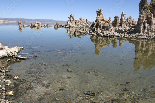 Mono Lake, California, Tufa Formations with reflections and Mountains in the Background