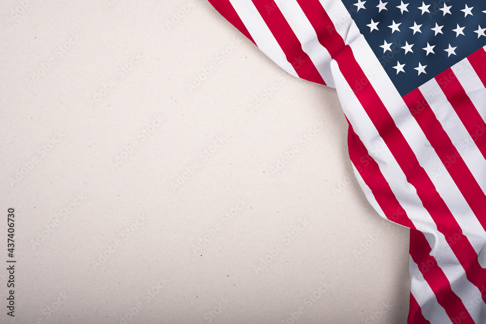 American flag on a neutral cardboard surface American flag on a neutral cardboard surface