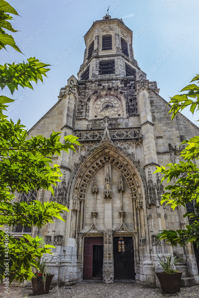 St. Leonard Church with a flamboyant Gothic style facade (fifteenth century) in Honfleur. Large octagonal tower date of 1760. Honfleur is a commune in the Calvados department in northwestern France.