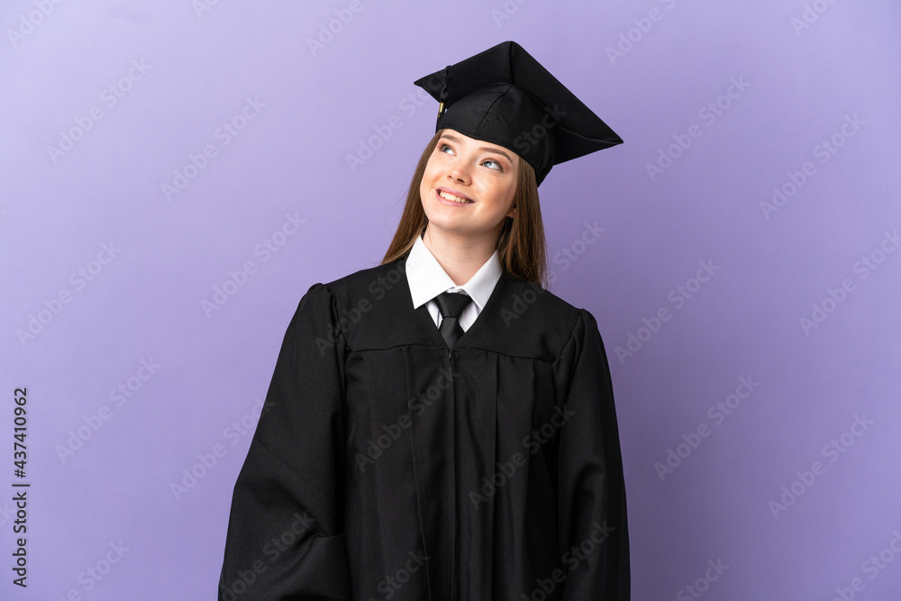 Young university graduate over isolated purple background thinking an idea while looking up Young university graduate over isolated purple background thinking an idea while looking up